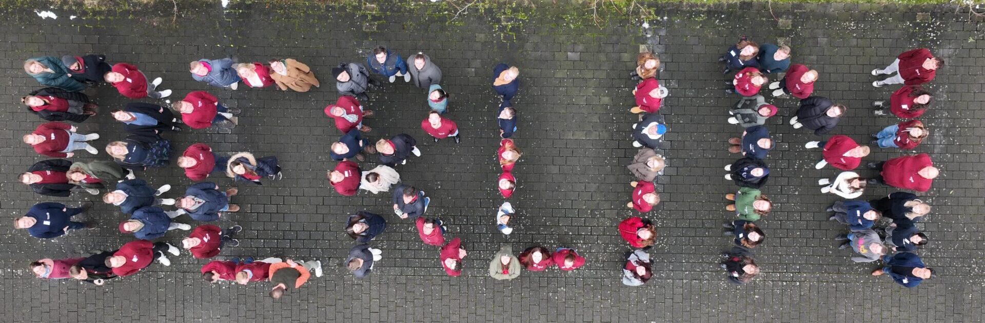 Gruppenbild RDK Sitzung Paderborn BERLIN Vogelperspektive: Menschen bilden das Wort